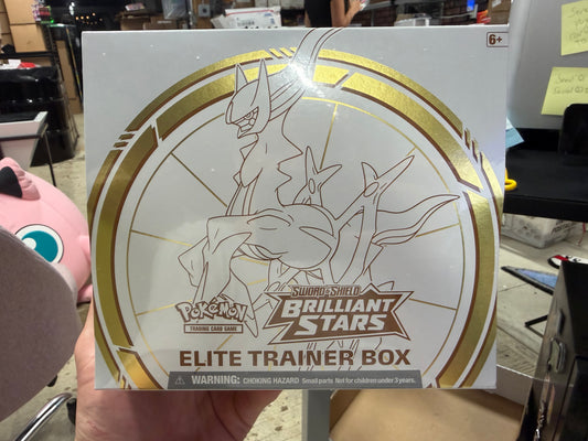 Brilliant ETB (Has small tear on front)